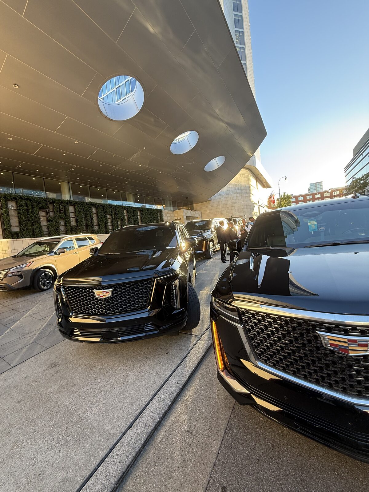 Escalade fleet at a Nashville hotel at sunset